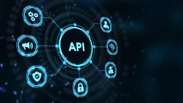 The word API is in a circle in the middle that connects with other icons that relate to applications